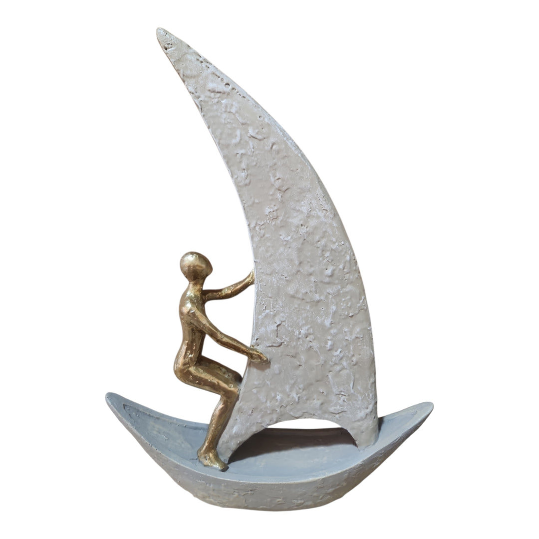 FIGURA DECORATIVA HOMBRE EN VELERO